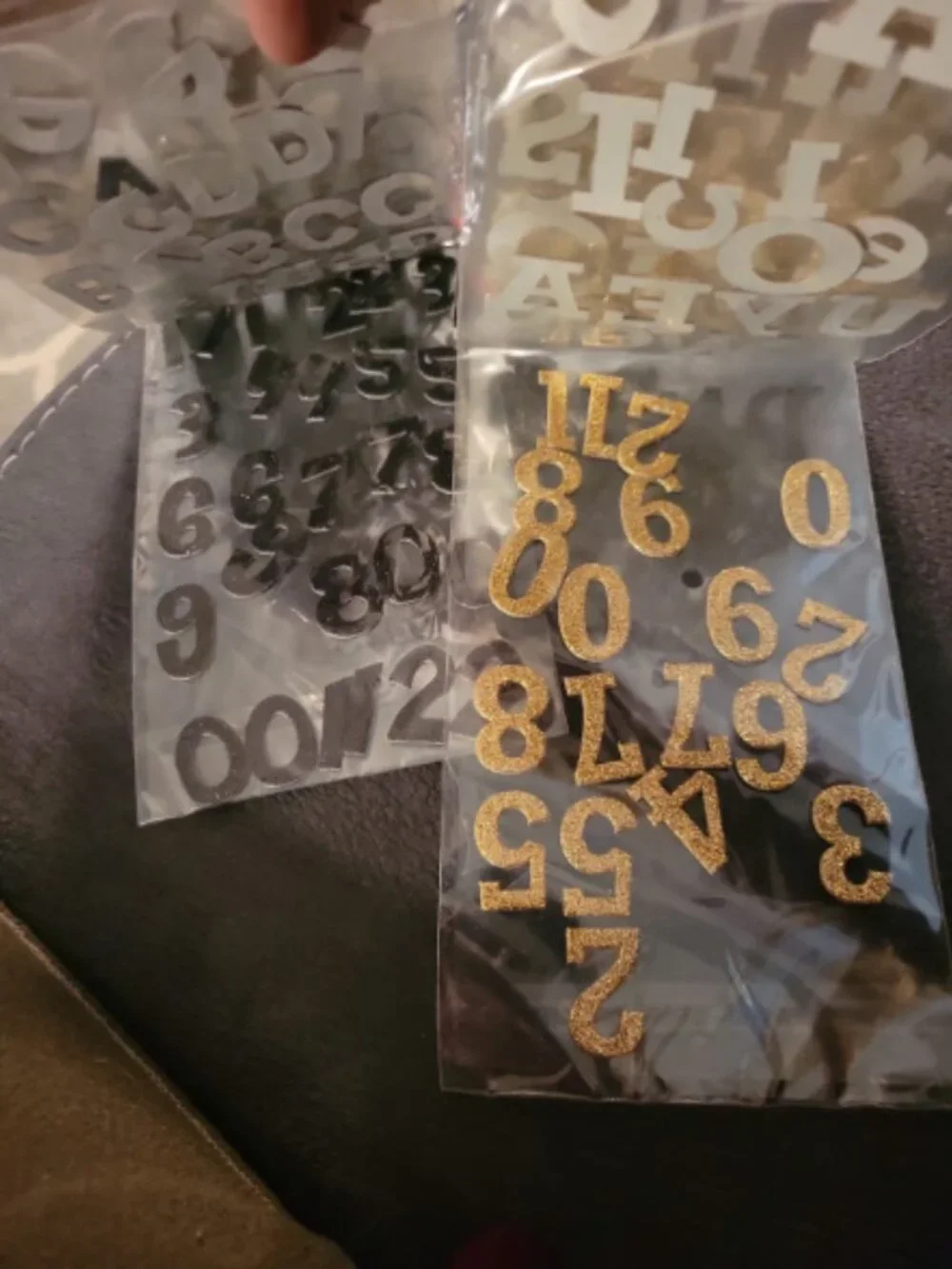 Alpha chips alphabet stockers. Gold and black
